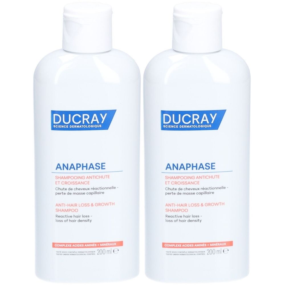 Deux flacons blancs de shampooing DUCRAY ANAPHASE. Étiquettes bleues avec nom et texte du produit. 200 ml.