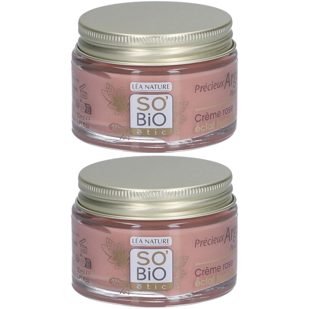 Zwei Tiegel Creme, Glasbehälter mit silberfarbenem Deckel. Aufschrift: SO'BiO etic, Crème rose. Rosa Creme sichtbar.