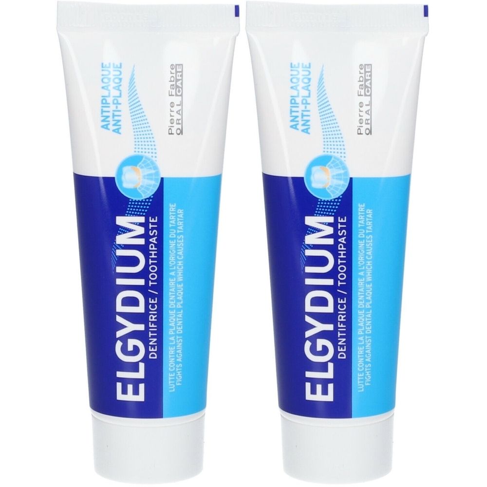 Zwei Tuben ELGYDIUM Antiplaque Zahnpasta. Weiß-blaue Verpackung mit Produktnamen und Text. Enthält Zahnpasta.