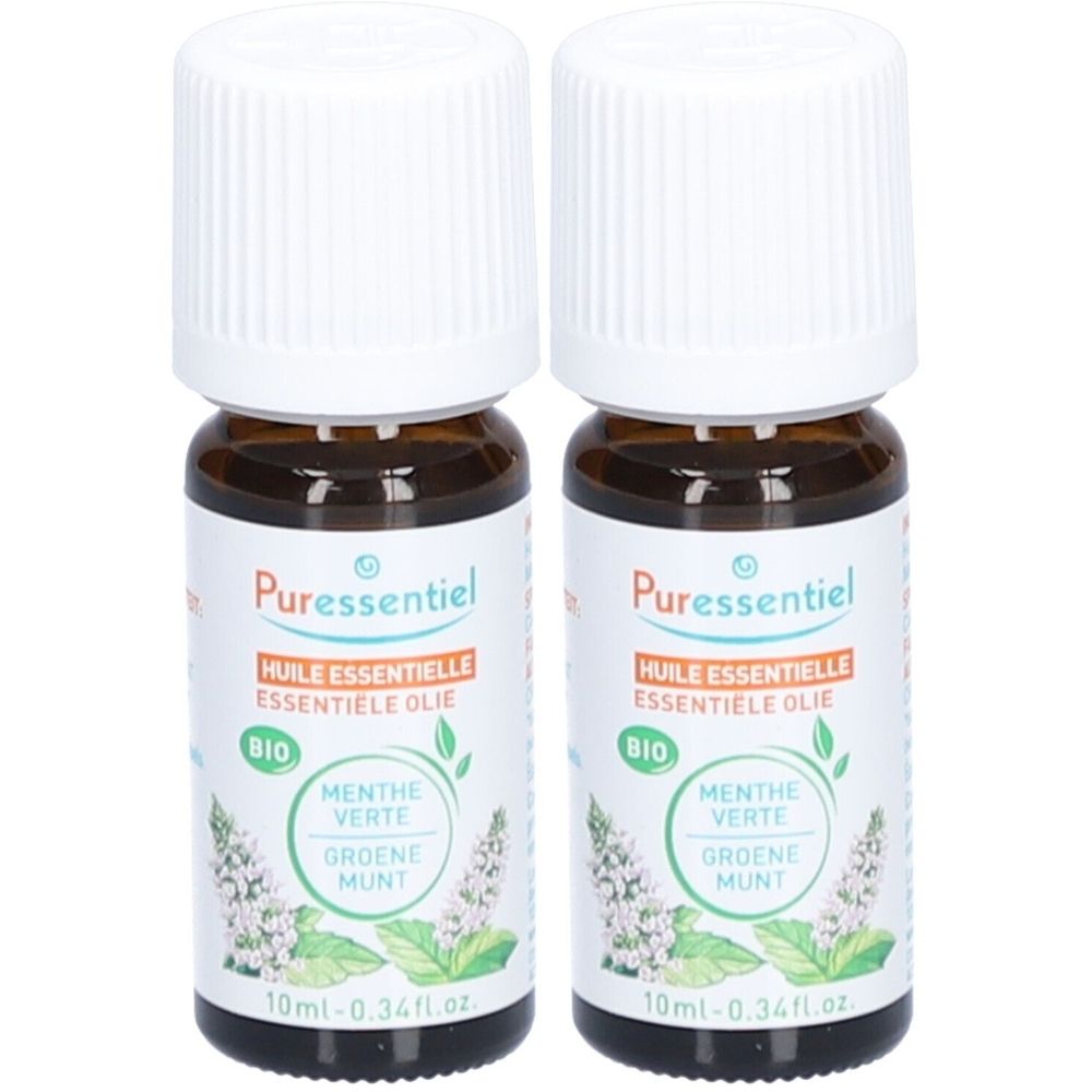 Deux flacons en verre brun avec bouchons blancs. Étiquettes avec "Puressentiel" et "Huile essentielle". Menthe verte.