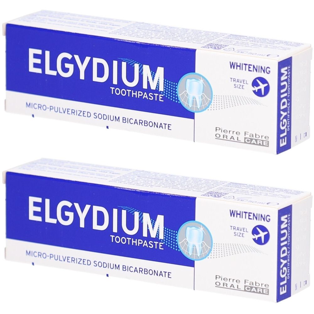 Deux boîtes de dentifrice. Boîtes bleues et blanches avec "ELGYDIUM TOOTHPASTE". Contient "MICRO-PULVERIZED SODIUM BICARBONATE". Indique "Whitening".