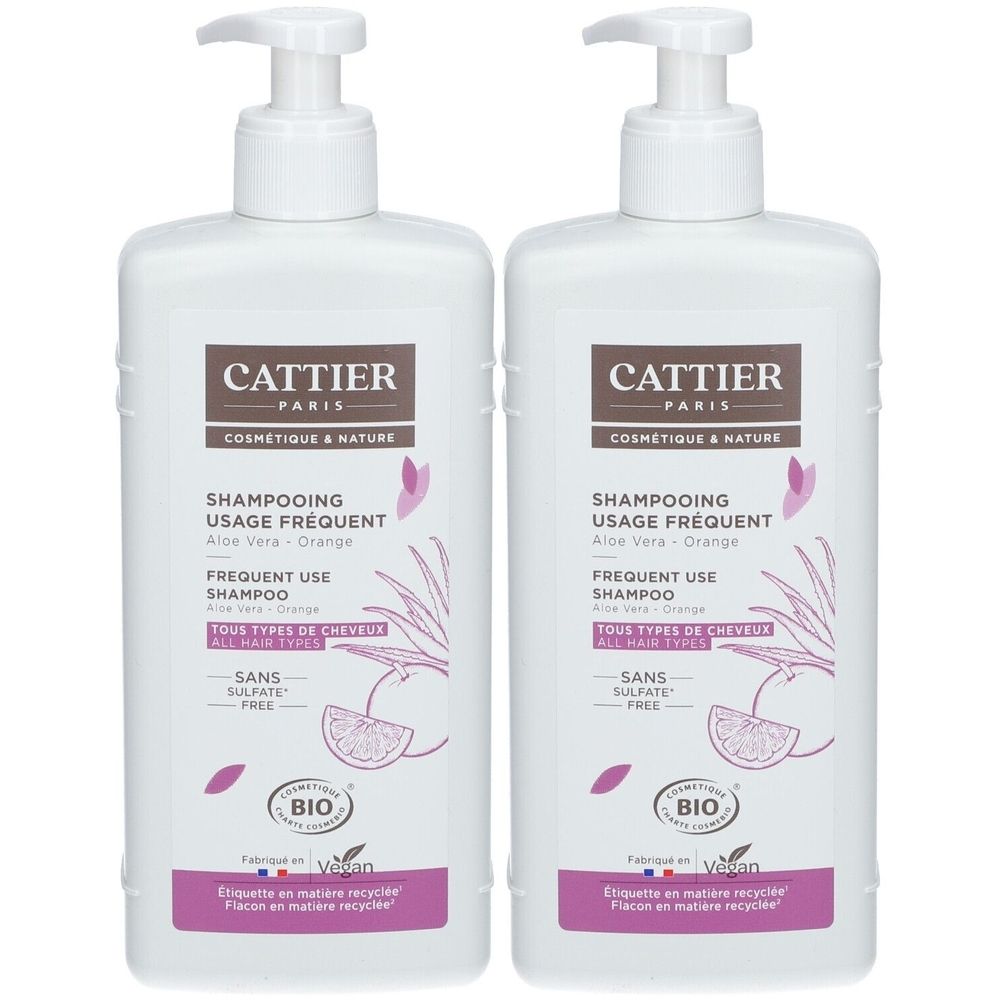 Zwei weiße Shampoo-Flaschen mit Pumpverschluss. Aufschrift: CATTIER, Shampoo Usage Frequent, Aloe Vera - Orange. Bio-Zertifizierung.