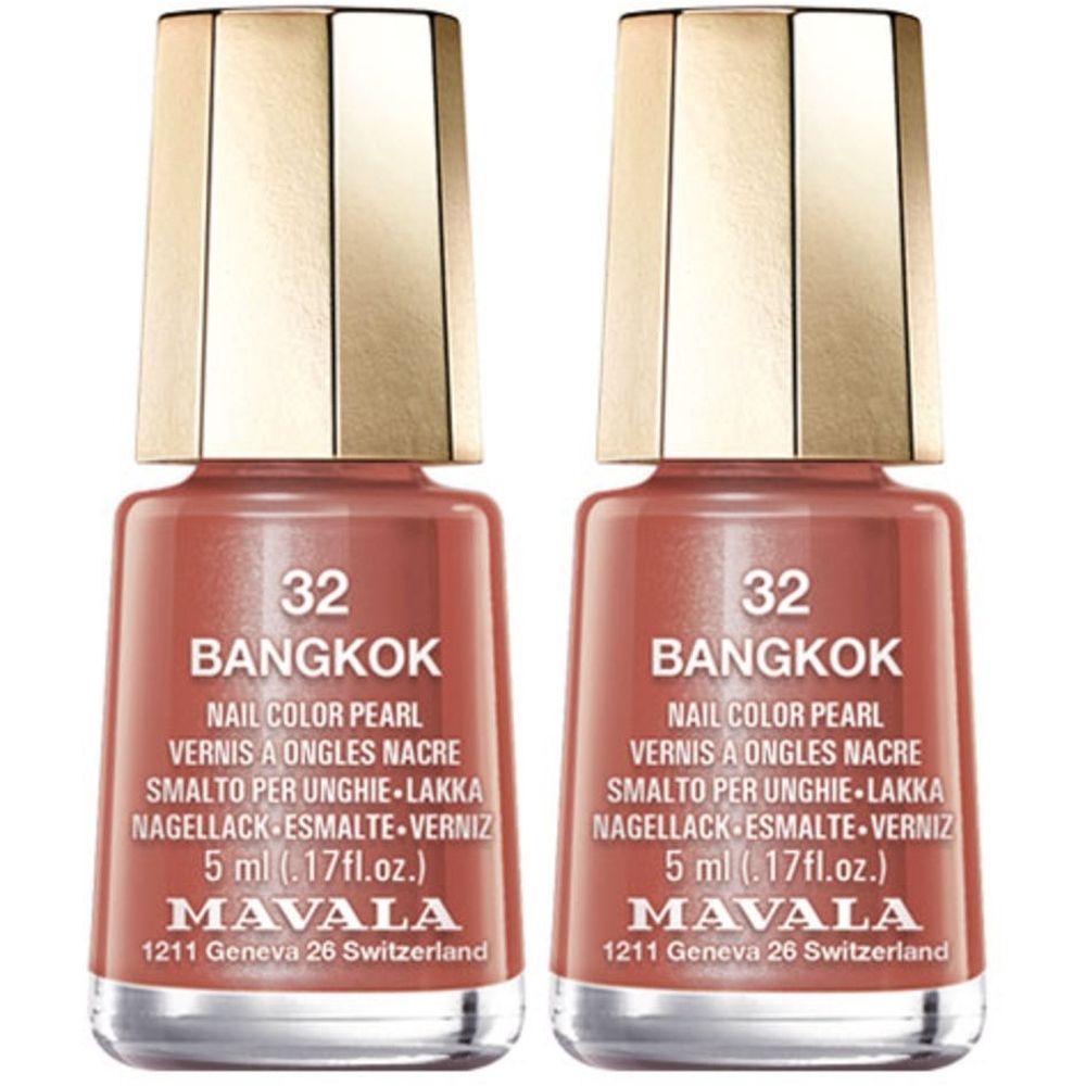 Zwei Nagellackflaschen, Farbe: Koralle. Aufschrift: 32 BANGKOK, MAVALA. Goldfarbener Deckel. 5 ml.