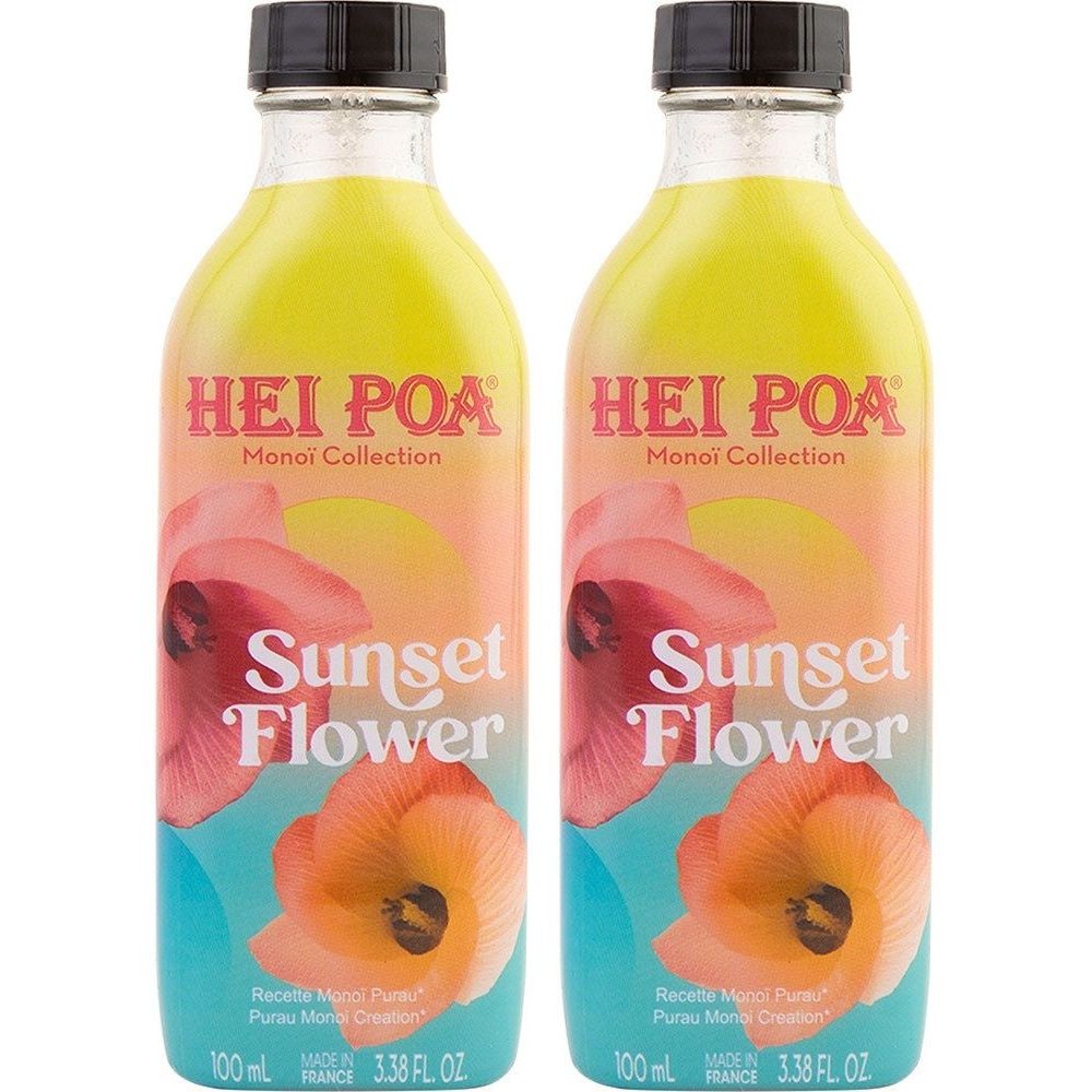Deux flacons HEI POA Monoï Sunset Flower. Étiquette avec motif floral et nom du produit. Bouchon noir, liquide jaune.