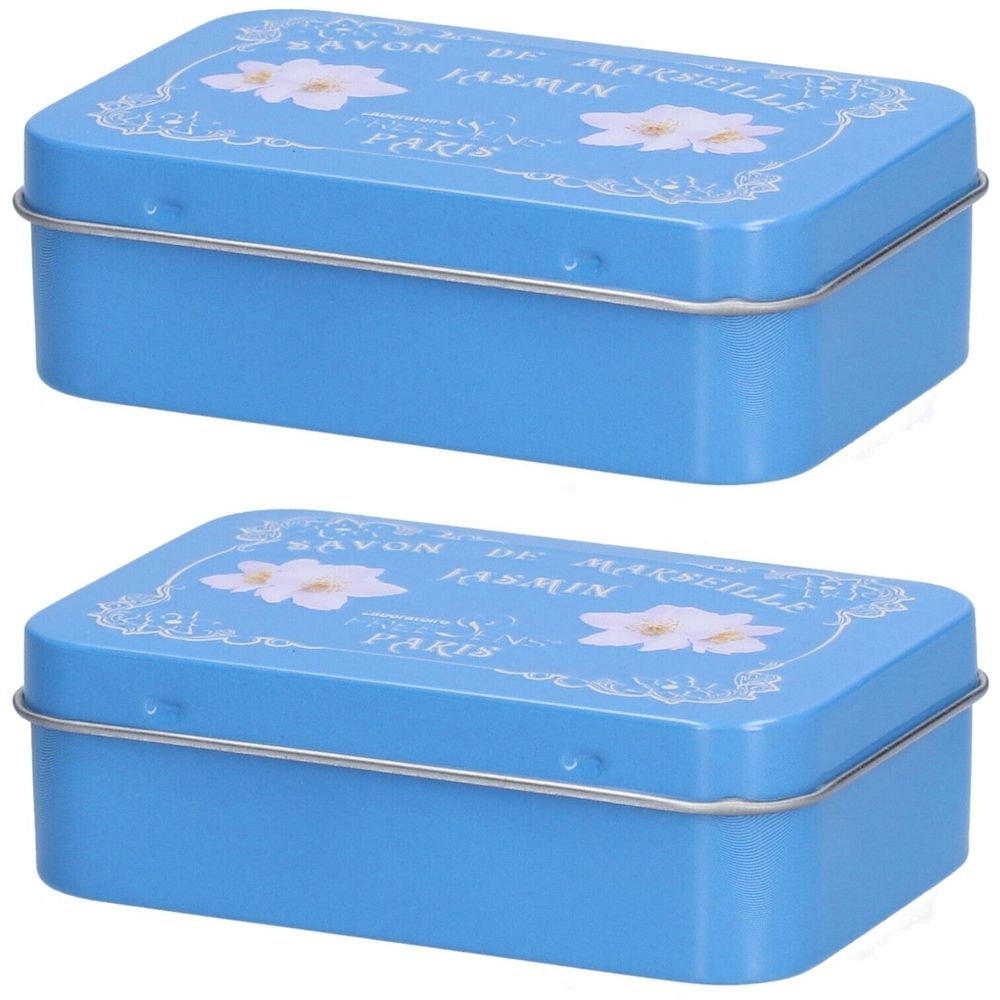 Deux boîtes métalliques bleues rectangulaires. Sur le couvercle : "Savon de Marseille Jasmin Paris" et motifs floraux. Cadre métallique.
