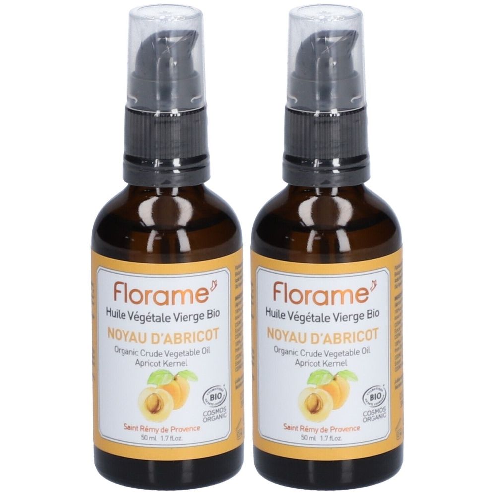 Zwei Flaschen Florame-Öl. Braune Glasflaschen mit Pumpaufsatz. Etikett mit Produktname und Bio-Siegel. Abgebildet sind Aprikosen.