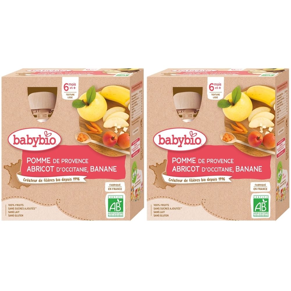 Deux boîtes de nourriture pour bébé Babybio. Inscription : Pomme, Abricot, Banane. Avec le label AB bio. Texte : 6+ mois.