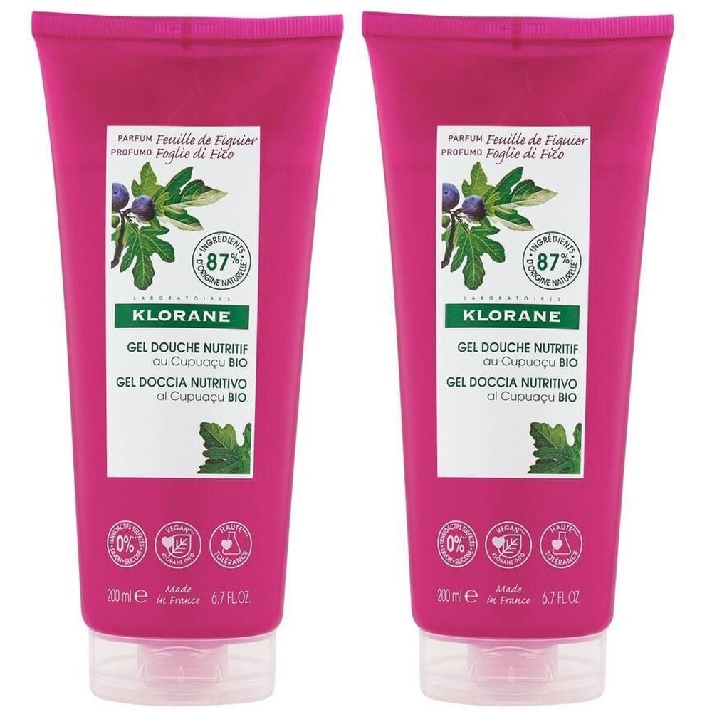 Deux tubes de gel douche roses. Étiquette blanche avec illustration de figue et feuilles. Inscription: KLORANE, Gel Douche Nutritif.
