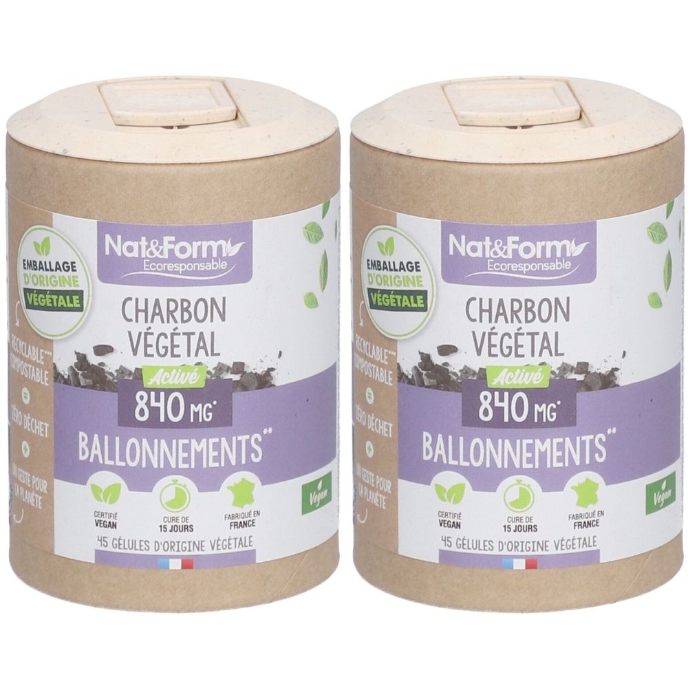 Deux boîtes cylindriques. Inscription: Nat&Form Charbon Végétal, 840 MG, Ballonnement. Emballage d'origine végétale, vegan, fabriqué en France.
