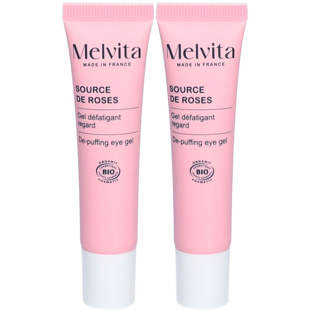 Zwei rosa Tuben mit weißem Verschluss. Aufschrift: Melvita, Source de Roses, Gel défatigant regard, De-puffing eye gel. Bio-Siegel.