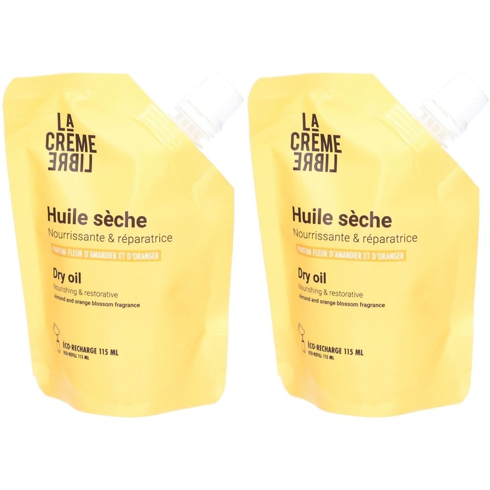 Deux recharges jaunes avec bouchon blanc. Inscription: La Crème Libre, Huile sèche, Dry oil. Eco Recharge 115 ml.