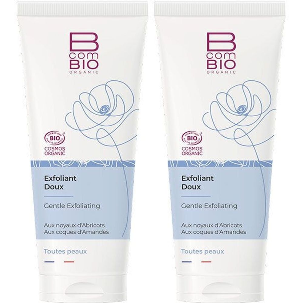 Zwei Tuben B COM BIO ORGANIC Exfoliant Doux. Weiß, mit Logo, floraler Zeichnung und Text. Bio-Zertifizierung.
