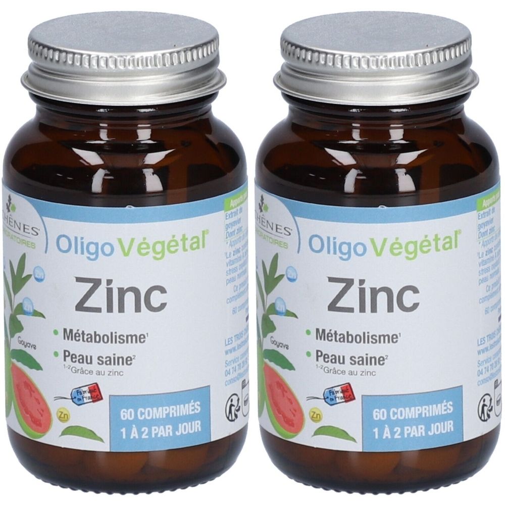 Zwei braune Glasflaschen mit silbernen Deckeln. Auf den Etiketten steht "Oligo Végétal Zinc". Text: "60 comprimés, 1 à 2 par jour".