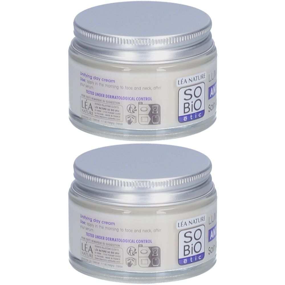 Deux pots de crème de jour SO BIO ETIC Lumi'Lys. Récipients en verre avec couvercles argentés. Inscription : SO BIO etic, LEA NATURE.