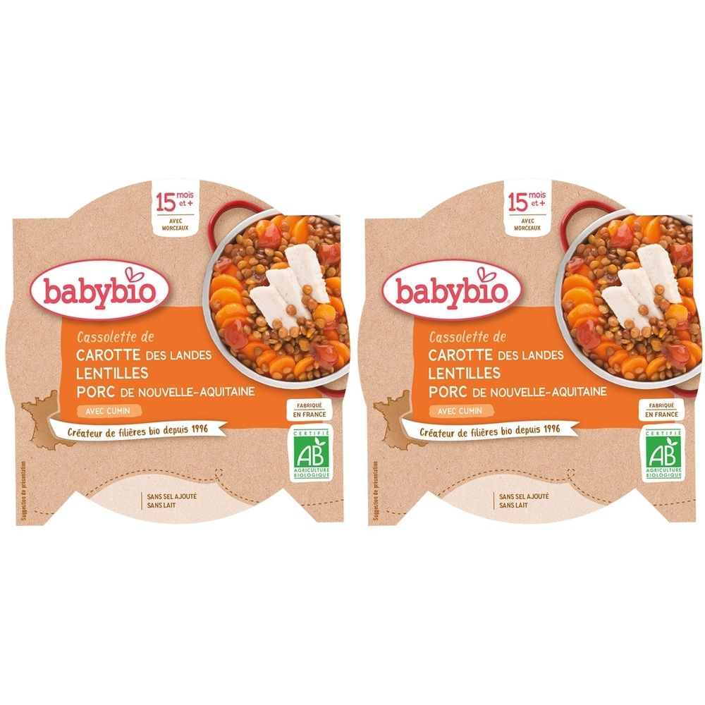 Deux barquettes Babybio Cassolette. Inscription carottes, lentilles, porc et cumin. Label AB. Dès 15 mois.