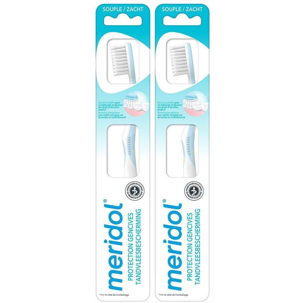Deux têtes de brosse à dents dans un emballage. Marque Meridol, inscription Protection Gencives, Tandvleesbescherming. Emballage bleu et blanc.