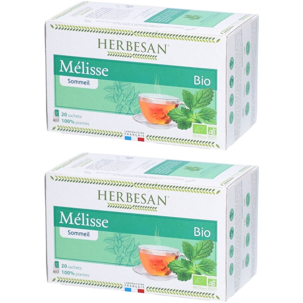 Deux boîtes de tisane. Inscription: HERBESAN Mélisse Sommeil Bio. Illustration: tasse de thé, feuilles de mélisse. 20 sachets.