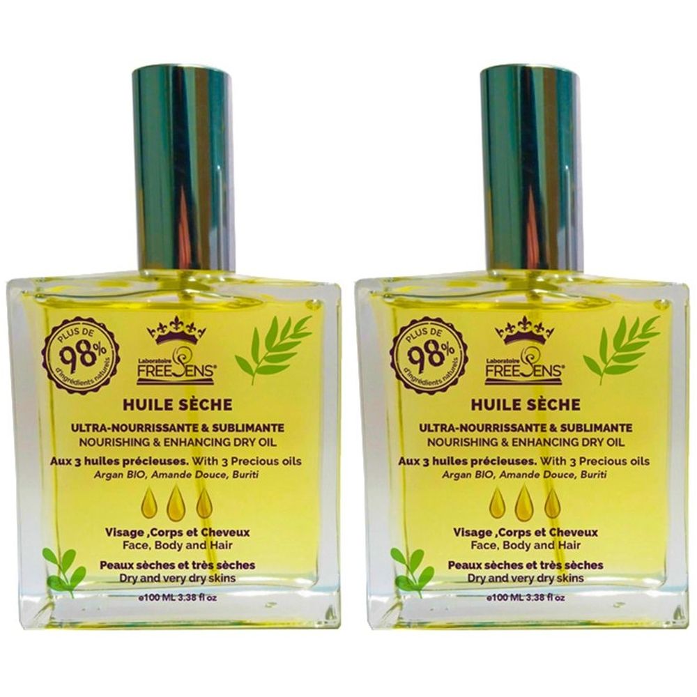 Zwei quadratische Glasflaschen mit gelbem Öl. Aufschrift: Huile Sèche, Ultra-Nourrissante & Sublimante. Mit 3 Ölen. Für trockene Haut.