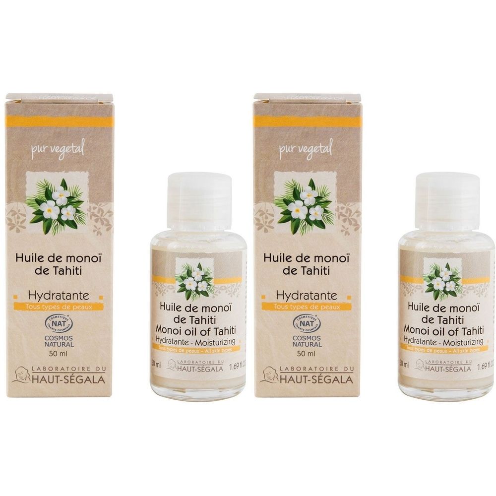 Drei Flaschen und zwei Kartons mit Produktaufdruck. Aufschrift: Huile de monoi de Tahiti, Hydratante, Cosmos Natural. Marke: Laboratoire du Haut-Ségala.