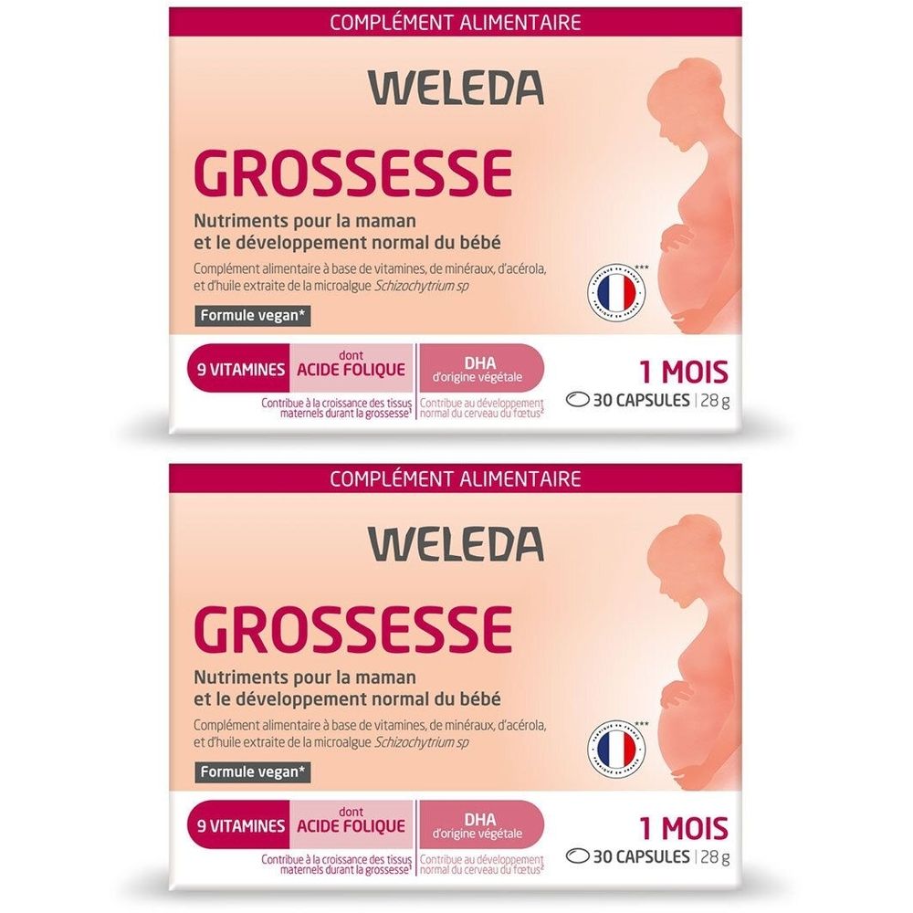Deux boîtes de WELEDA Grossesse. Emballage rose avec texte et silhouette de femme enceinte. Contient 30 gélules.