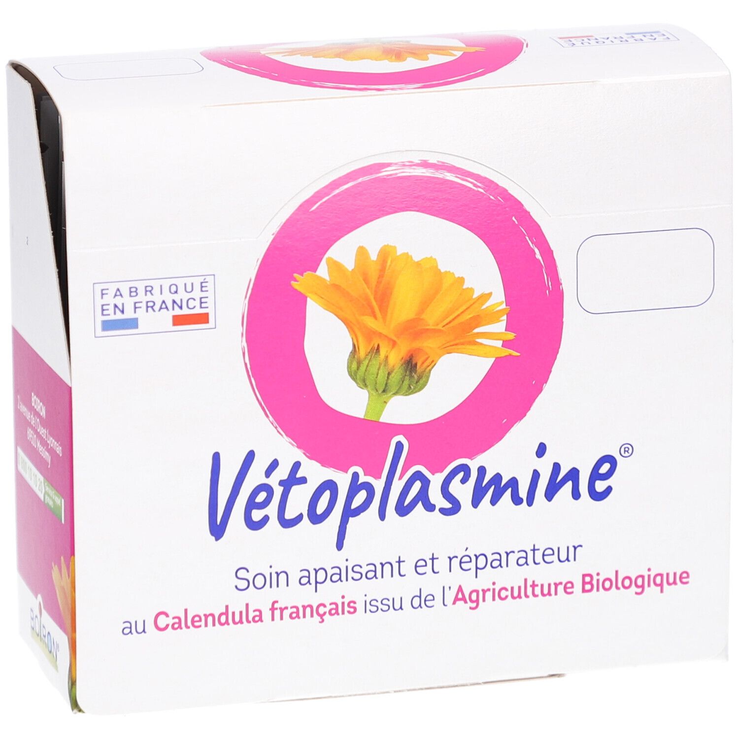 Weißer Karton mit rosa Akzenten. Aufdruck: Vétoplasmine, Ring mit Blüte, Text. Hergestellt in Frankreich. BOIRON-Logo.