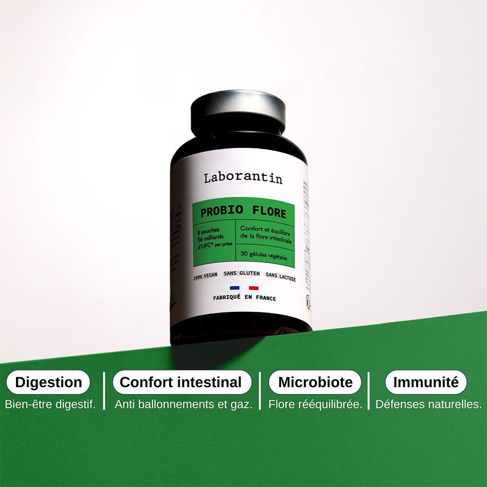 Flasche PROBIO FLORE auf grünem Hintergrund. Wörter: Verdauung, Darmkomfort, Mikrobiota, Immunität. Text in Französisch.