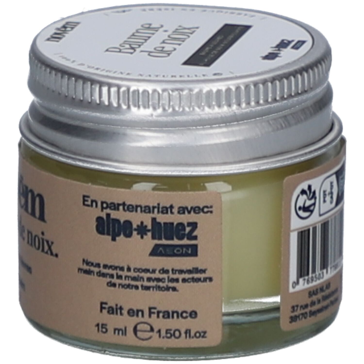 Glas mit silbernem Deckel. Aufkleber mit Produktnamen: novëm Baume de noix. 15 ml. Hergestellt in Frankreich. In Partnerschaft mit alpe+huez.