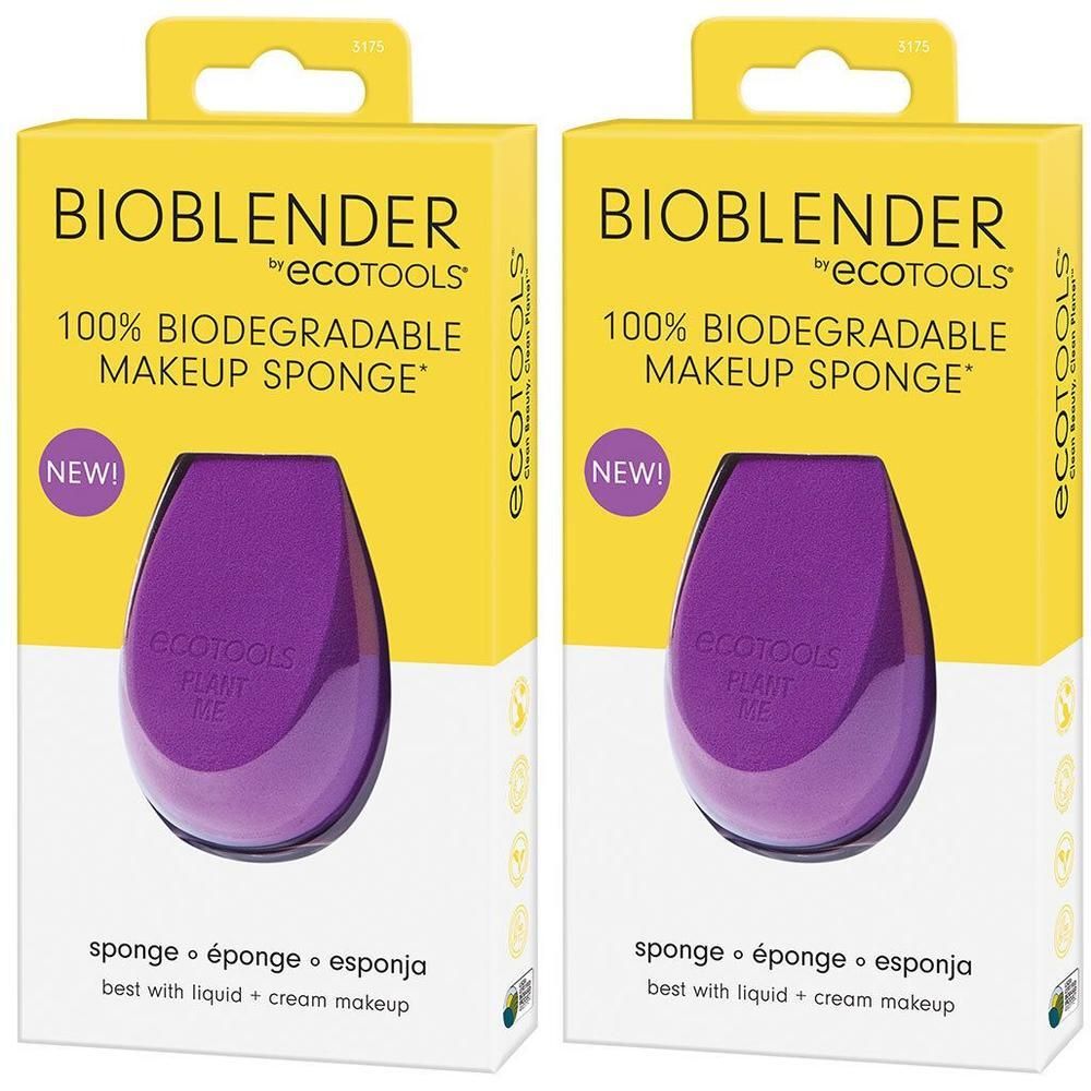 Zwei violette, biologisch abbaubare Make-up-Schwämme von EcoTools in gelber Verpackung.