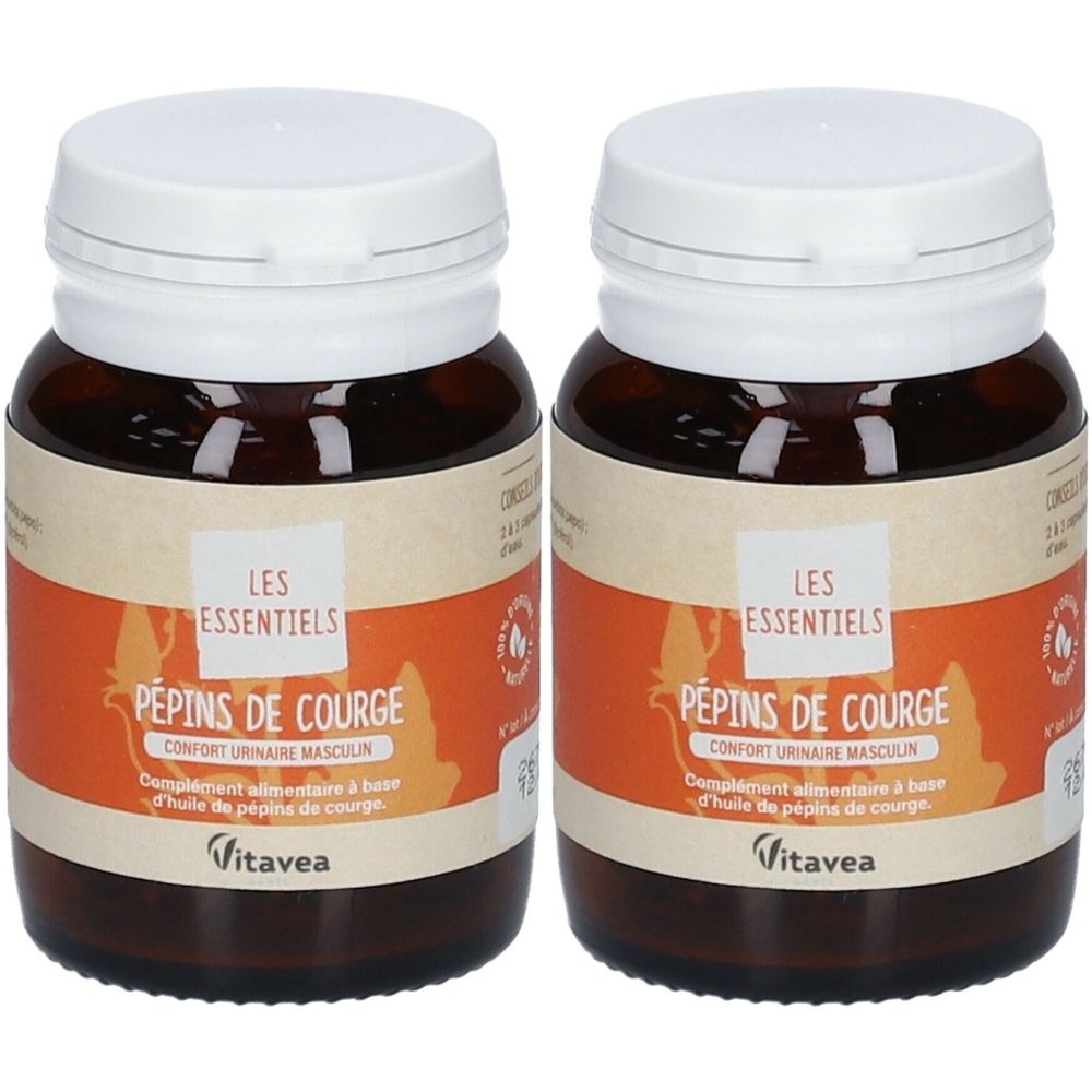 Deux flacons bruns avec des bouchons blancs. Étiquettes avec "LES ESSENTIELS PÉPINS DE COURGE".