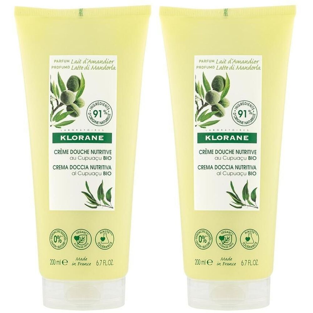 Deux tubes jaunes. Inscription: KLORANE, Crème Douche Nutritive. Avec extrait d'amande et Cupuaçu bio. 91% d'ingrédients d'origine naturelle.