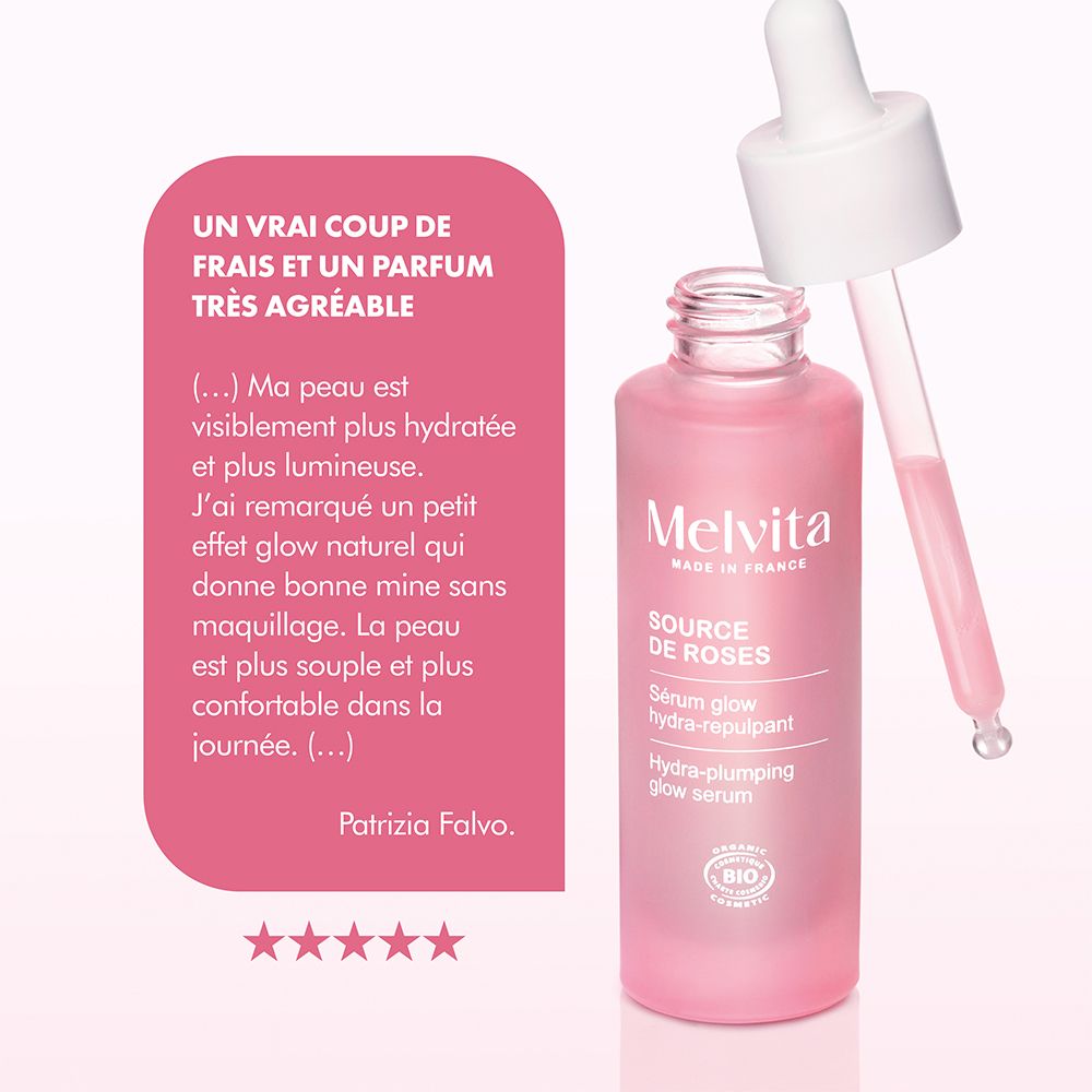 Rosa Flasche mit Pipette. Text und Sterne. Zitat: Haut ist sichtbar hydratisiert.