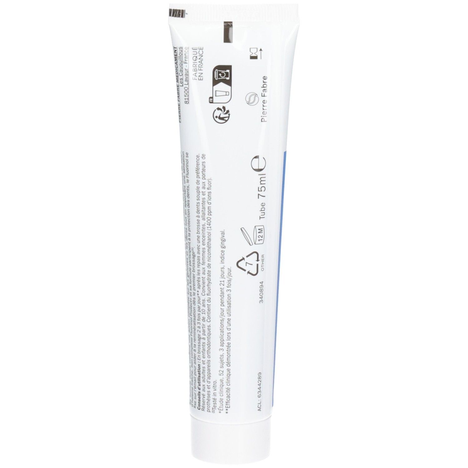 Dos du tube de dentifrice. Texte et symboles noirs sur fond blanc. Informations fabricant et numéro de lot.