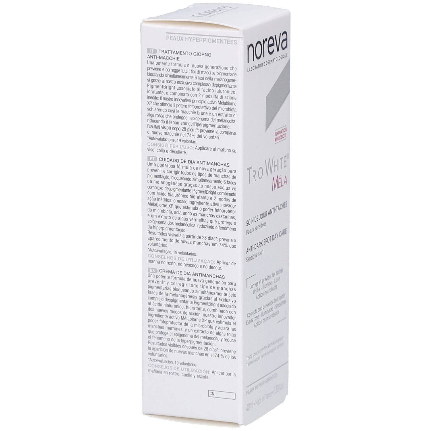 Seitenansicht der weißen Noreva Trio White Méla Verpackung. Text in italienischer und spanischer Sprache.