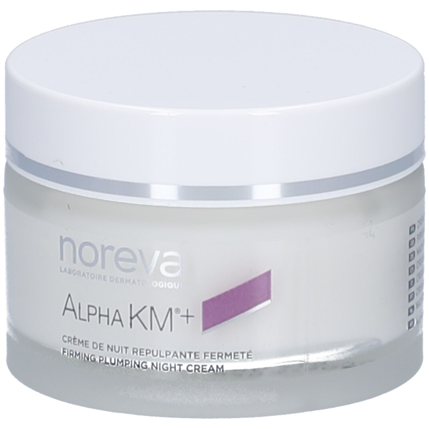 Creme-Glas mit weißem Deckel. Aufschrift: Noreva, Alpha KM+, Crème de nuit repulpante fermeté. Lila Akzent.