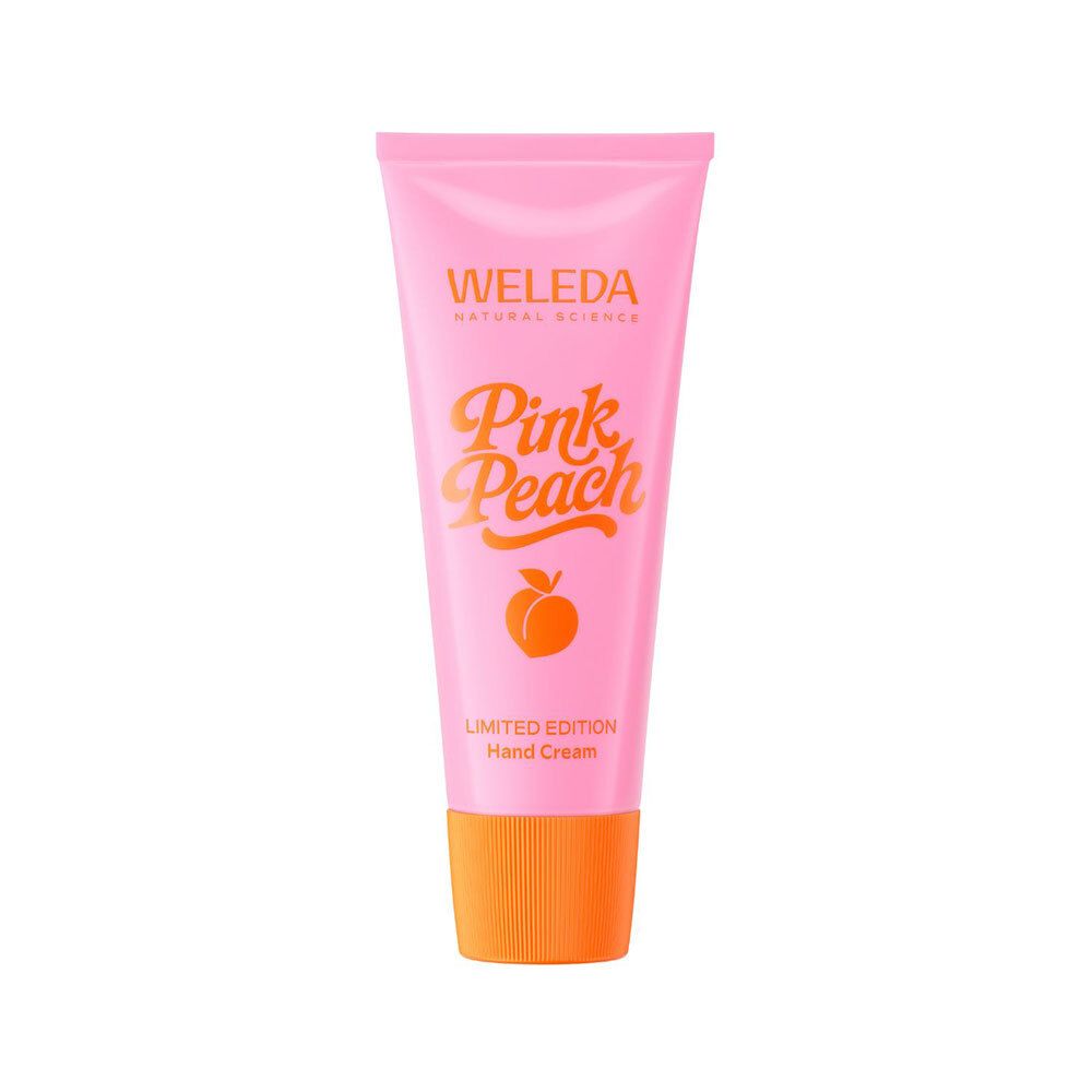 Rosa Tube mit orangefarbenem Verschluss. Aufschrift: Pink Peach, Limited Edition Hand Cream.