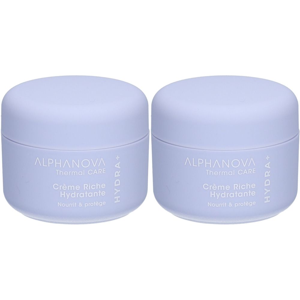 Deux pots de crème bleus avec couvercles. Inscription: ALPHANOVA Thermal CARE Crème Riche Hydratante. Hydra+.
