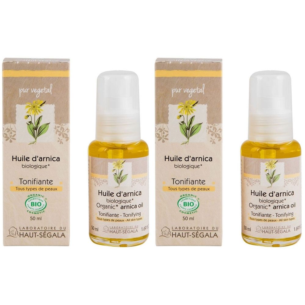 Quatre flacons et boîtes avec étiquettes. Inscription: Huile d'arnica biologique, Tonifiante, certification BIO.
