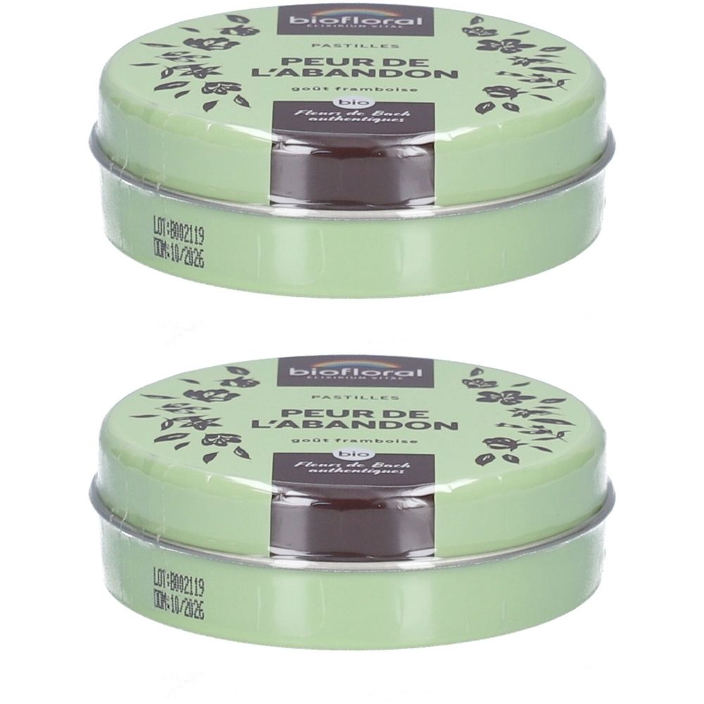 Zwei runde, grüne Metalldosen mit Aufschrift BIOFLORAL. Aufschrift: PEUR DE L'ABANDON. Sichtbar: Pastillen in einer transparenten Verpackung.