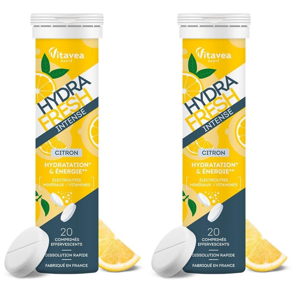 Zwei zylindrische Behälter mit Tabletten. Aufschrift: Hydra Fresh Intense Citron. Zwei Tabletten liegen daneben. Zitronen-Illustrationen.