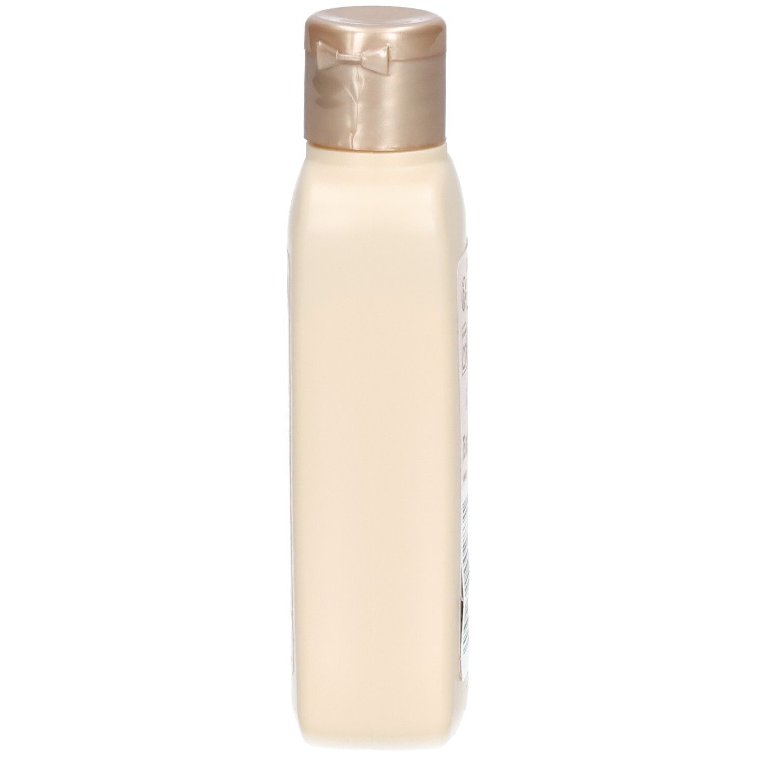Beige Lotion-Flasche, Seitenansicht. Goldfarbener Deckel. Rechteckige Form.