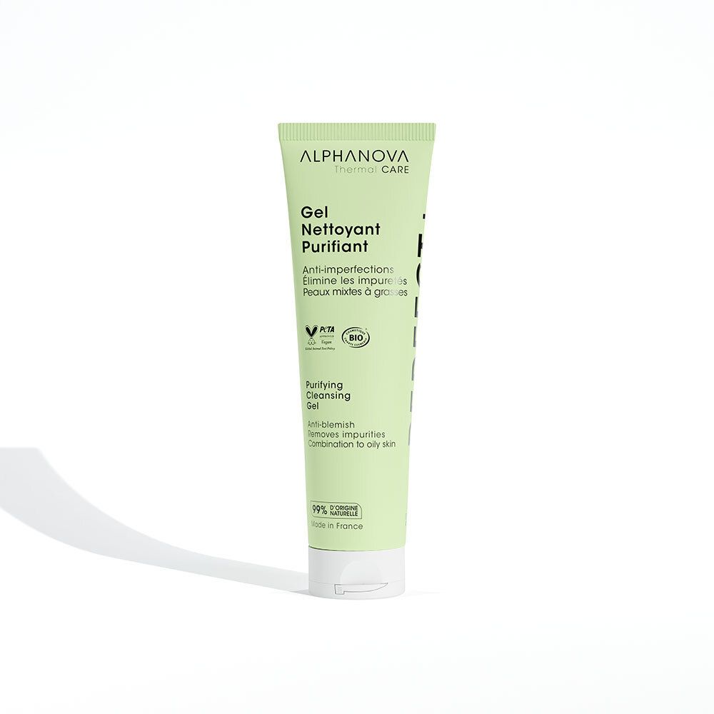 Grüne Tube mit Produktbezeichnung und Logo. Text: Gel Nettoyant Purifiant, Anti-Imperfektionen. Vegan- und Bio-Siegel.