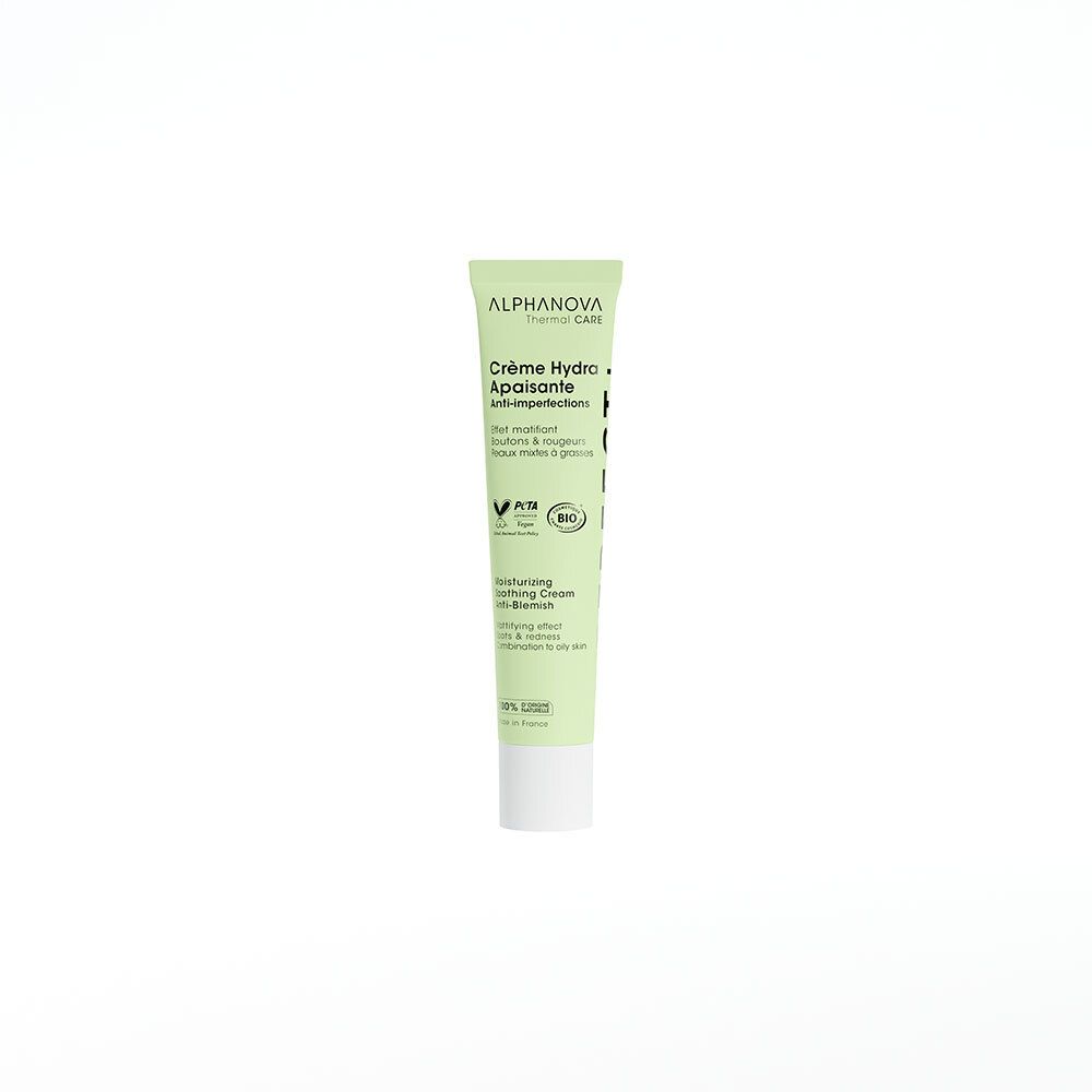 Tube vert et blanc. Texte: ALPHA NOVA, Crème Hydra Apaisante, Anti-imperfections. Logos vegan et bio.