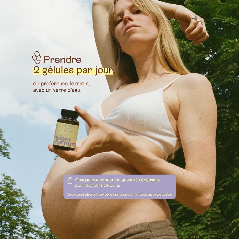 Schwangere Frau hält eine Flasche. Text: "Prendre 2 gélules par jour".