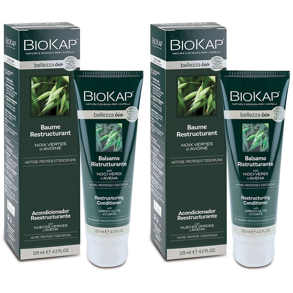 Zwei Tuben und Schachteln. Auf den Tuben und Schachteln steht BIOKAP. Auf den Tuben steht Balsamo Ristrutturante. Auf den Schachteln steht Baume Restructurant.