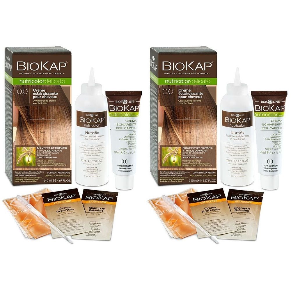 Plusieurs boîtes de crème éclaircissante pour cheveux. Comprend des flacons, des tubes et des sachets. Marque : BIOKAP.
