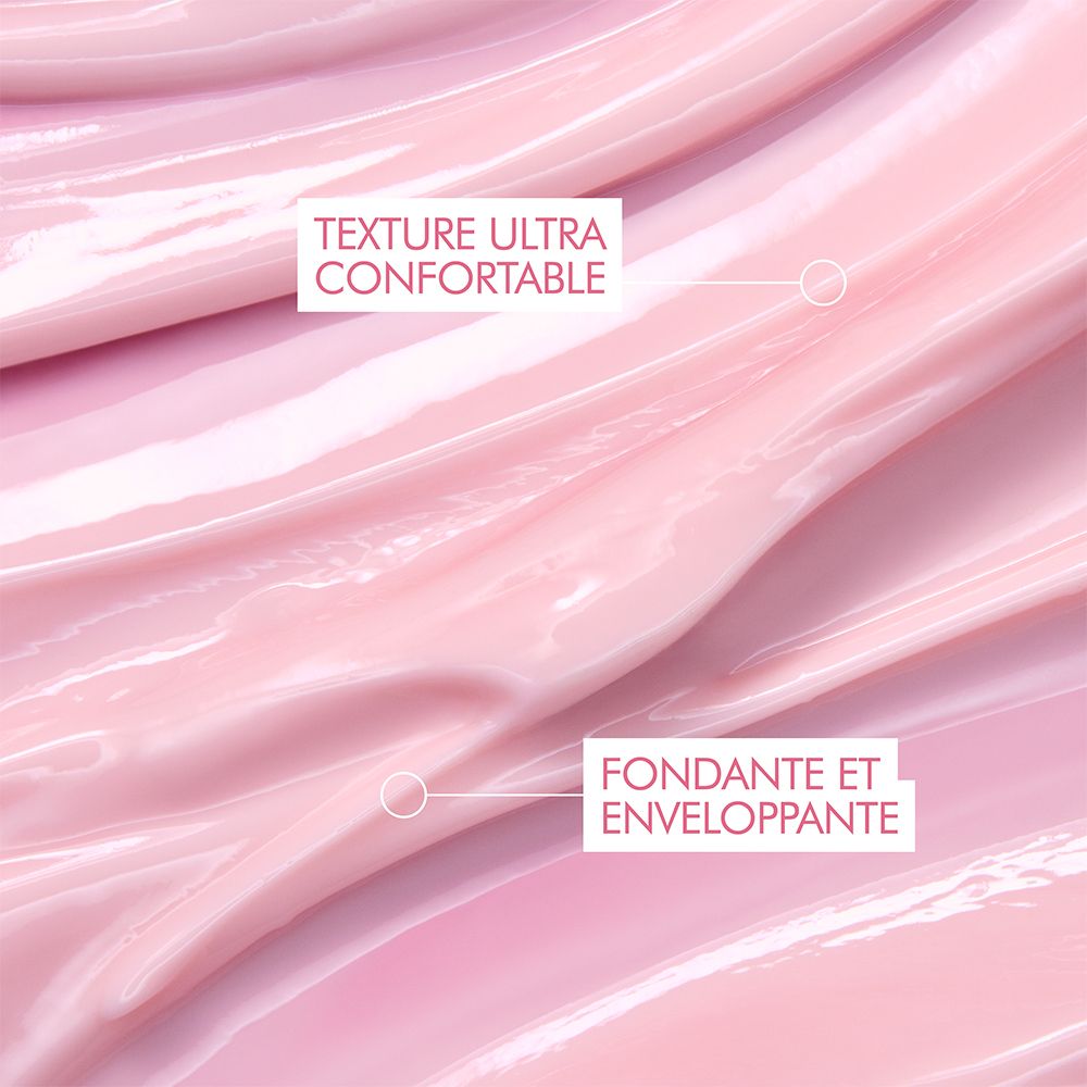 Nahaufnahme von rosa Creme. Text: Ultra-komfortable Textur, schmelzend und umhüllend.
