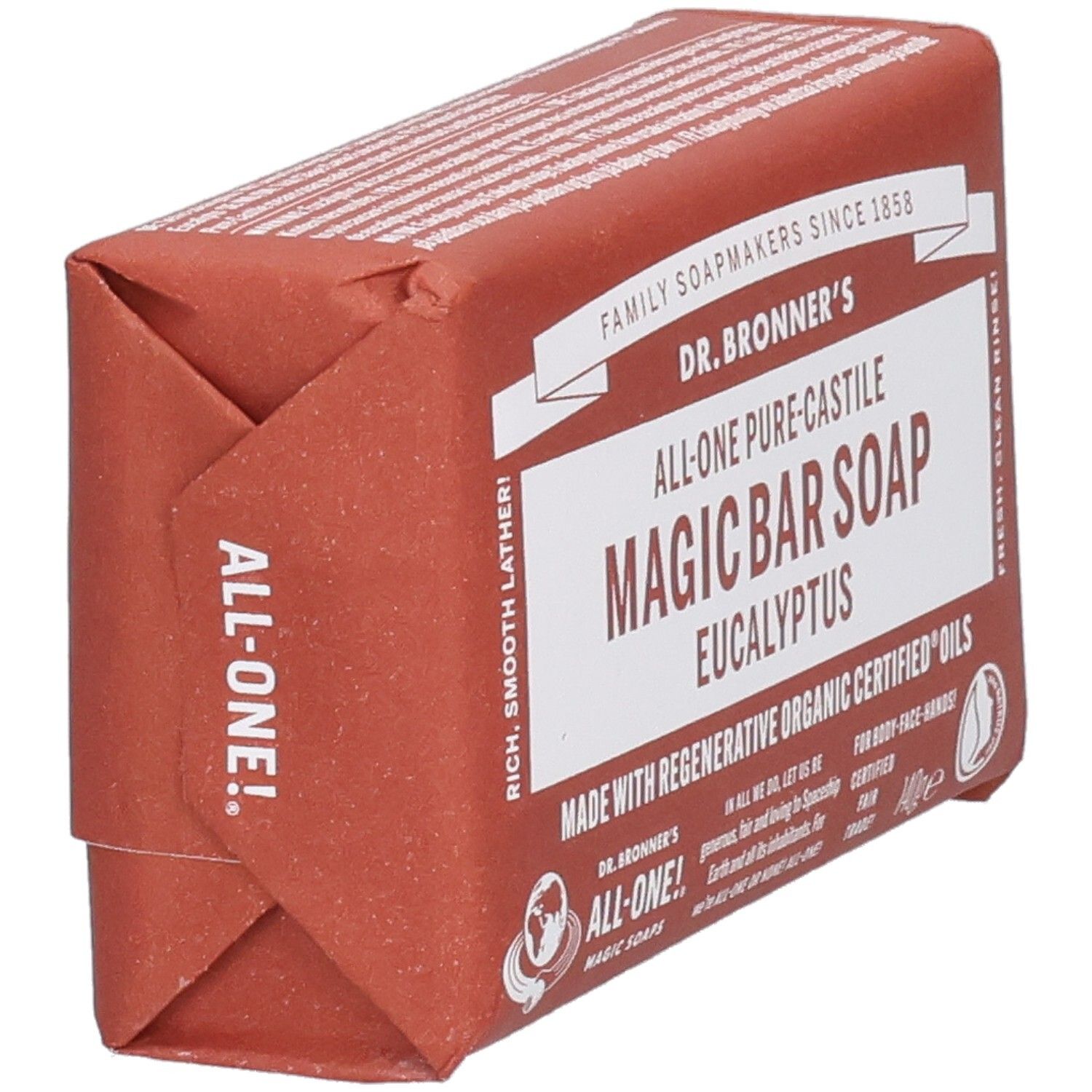 Seifenriegel in Papierverpackung, schräg. Aufschrift: Dr. Bronner's Magic Bar Soap Eucalyptus. Fair Trade Siegel.