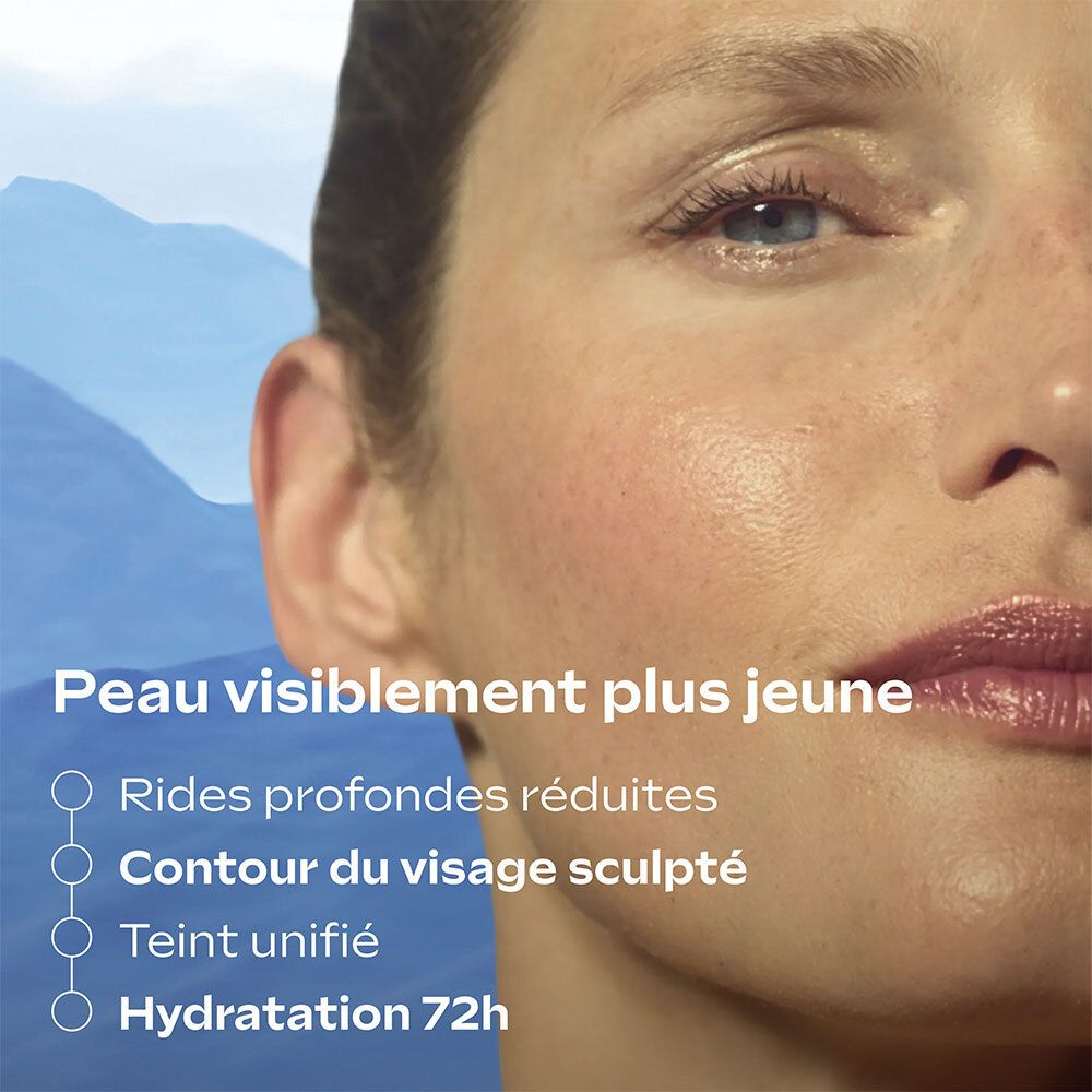 Nahaufnahme eines Gesichts. Text: Peau visiblement plus jeune. Rides profondes réduites, Contour du visage sculpté, Teint unifié, Hydratation 72h.