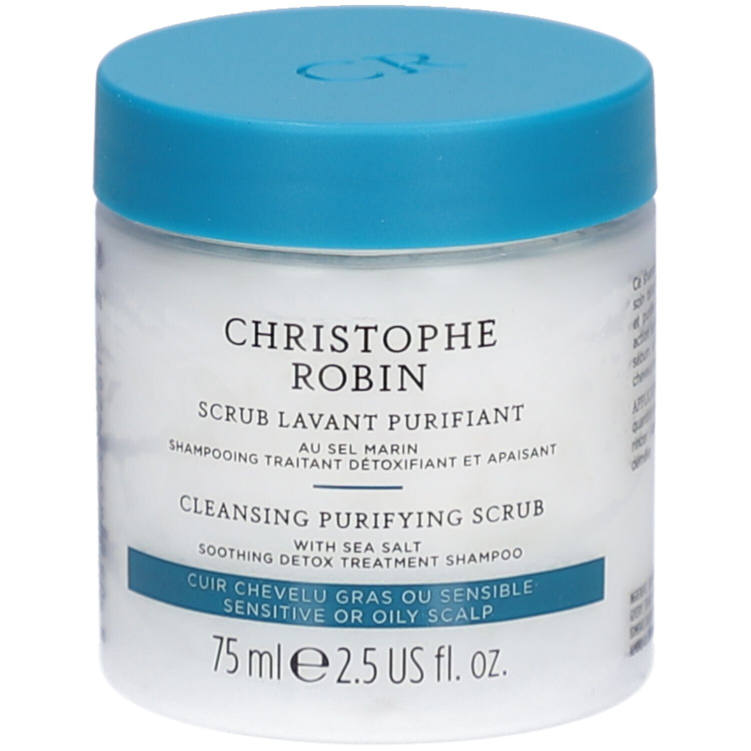 Weißes Tiegel mit blauem Deckel. Aufschrift: CHRISTOPHE ROBIN, SCRUB LAVANT PURIFIANT, CLEANSING PURIFYING SCRUB. Für fettige oder empfindliche Kopfhaut.