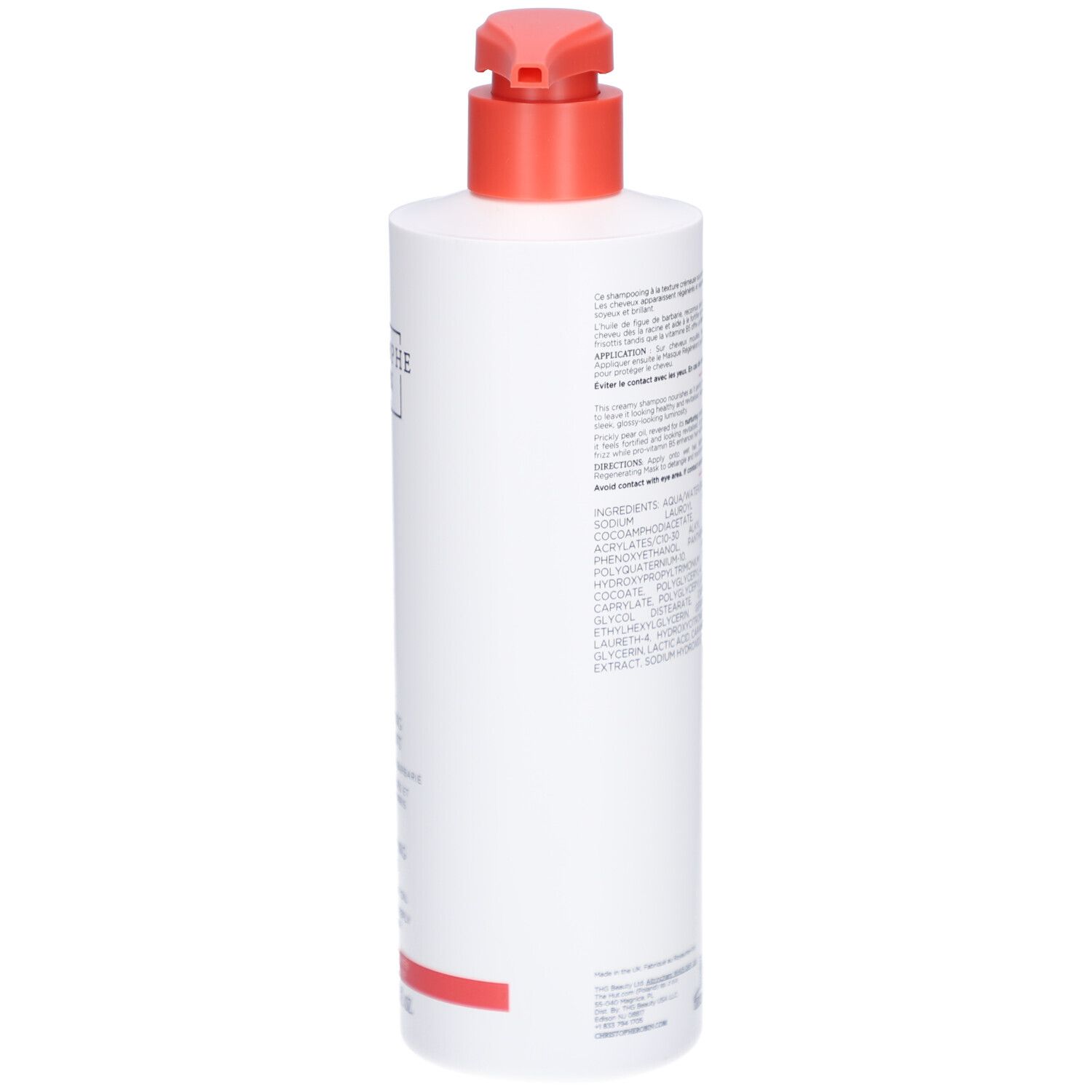Rückseite einer weißen Flasche mit rotem Pumpkopf. Text auf dem Etikett.